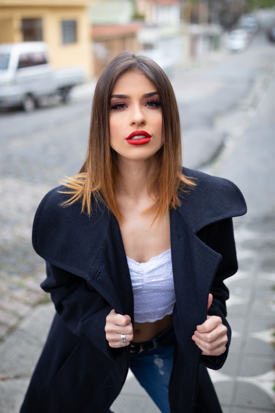 Woman in a dark coat on a city street